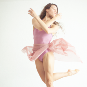 a dancer jumping representing - rest is part of the process